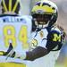 Michigan senior quarterback Denard Robinson questions the lack of a call by a ref during the first quarter of the Outback Bowl at Raymond James Stadium in Tampa, Fla. on Tuesday, Jan. 1. Melanie Maxwell I AnnArbor.com